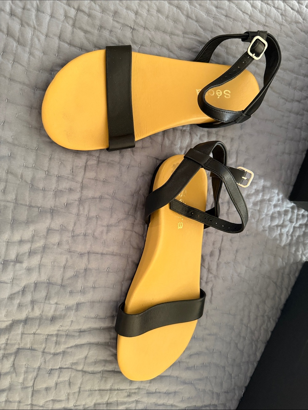 Black strapped sandals with arch support for women